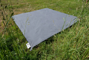 Zip Carpet gris foncé 01 Bent.webp